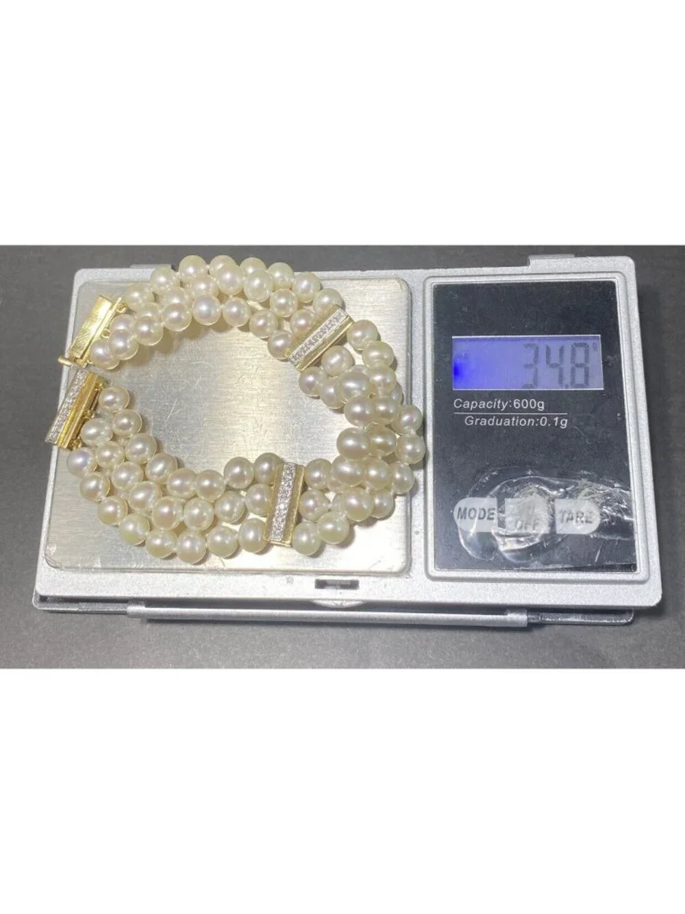 14k Gold Pearl And Diamond Spacer Bracelet 3 Rows Knotted 7.5 inches 18 Diamonds